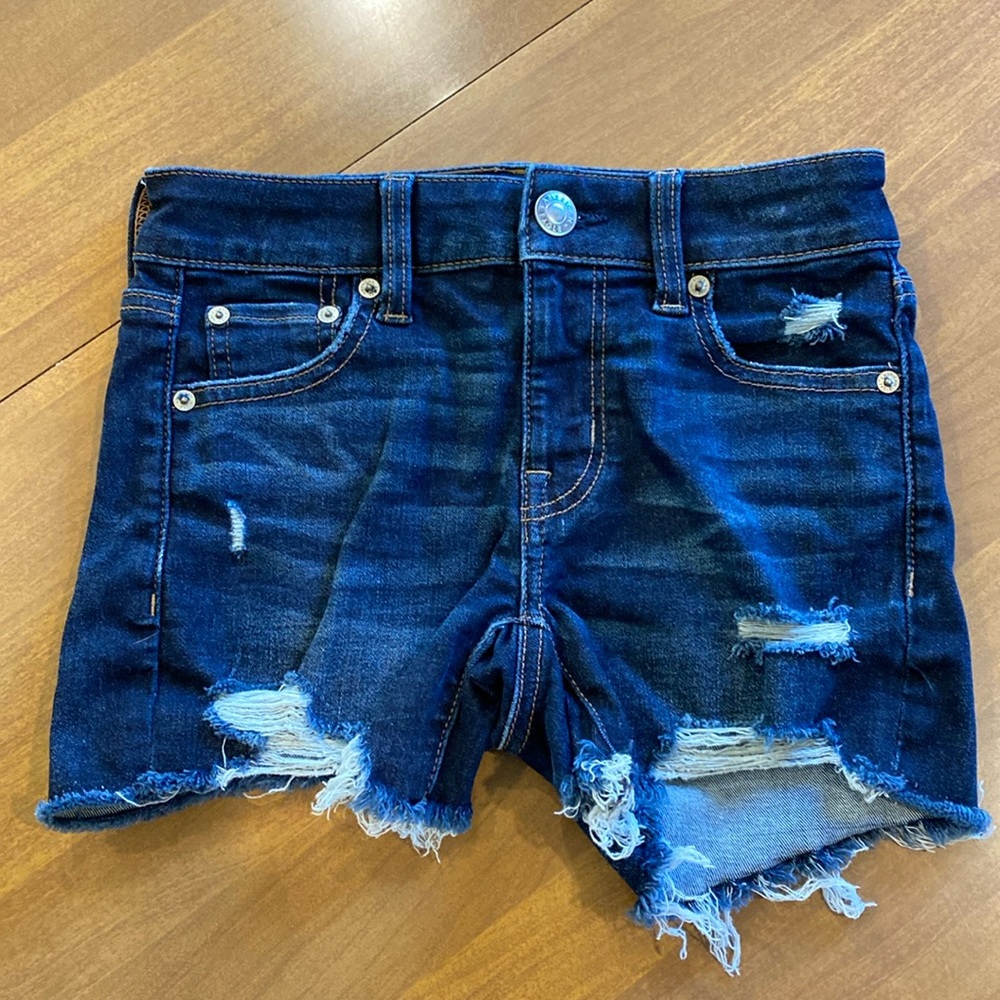 American Eagle.  Next level stretch. MIDI.  Size 00 dark denim shorts.